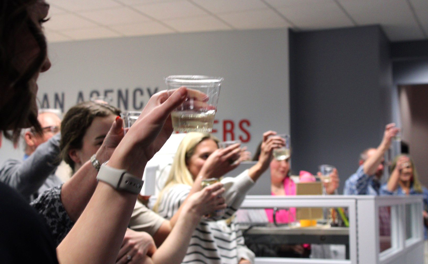 Crawford employees celebrate the agency's 14th year anniversary