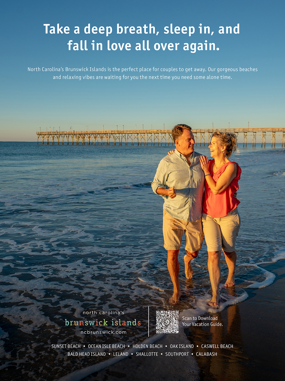 Couple at beach with pier