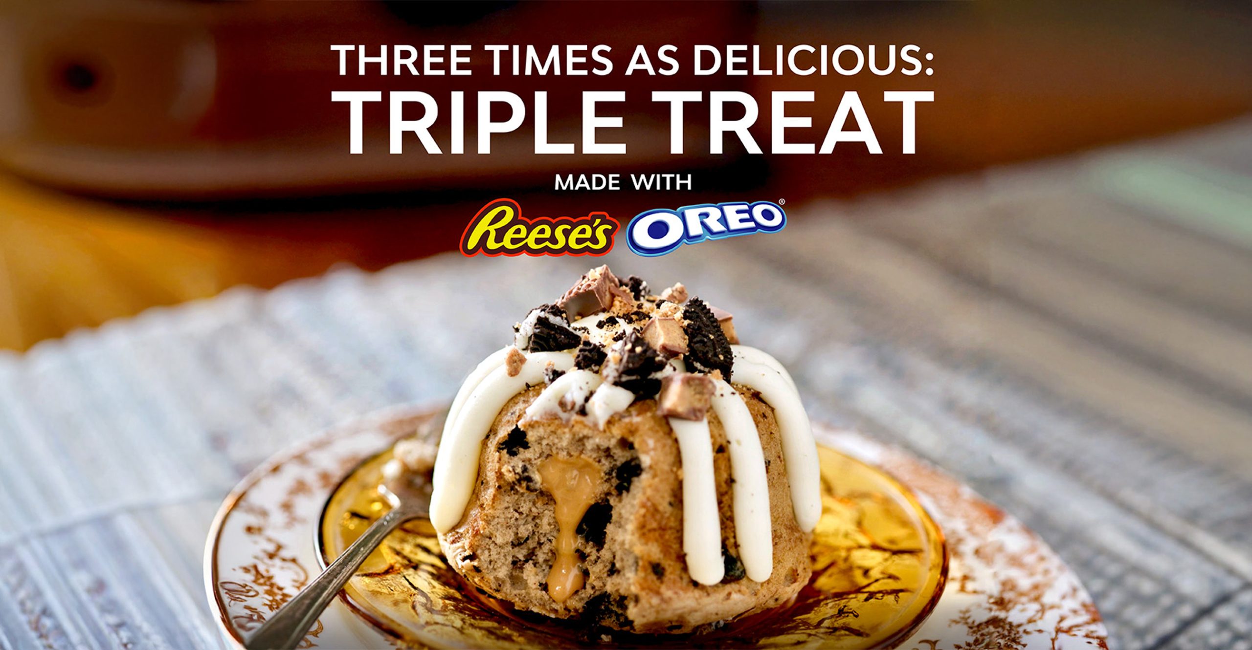 Reese's and Oreo bundt cake with peanut butter filling and mixed toppings