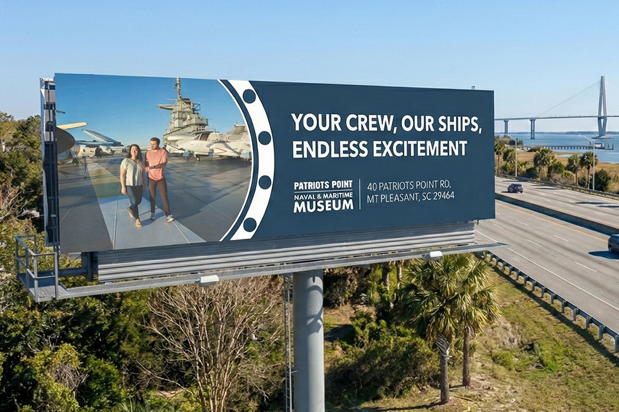 Highway billboard featuring couple on USS Yorktown flight deck