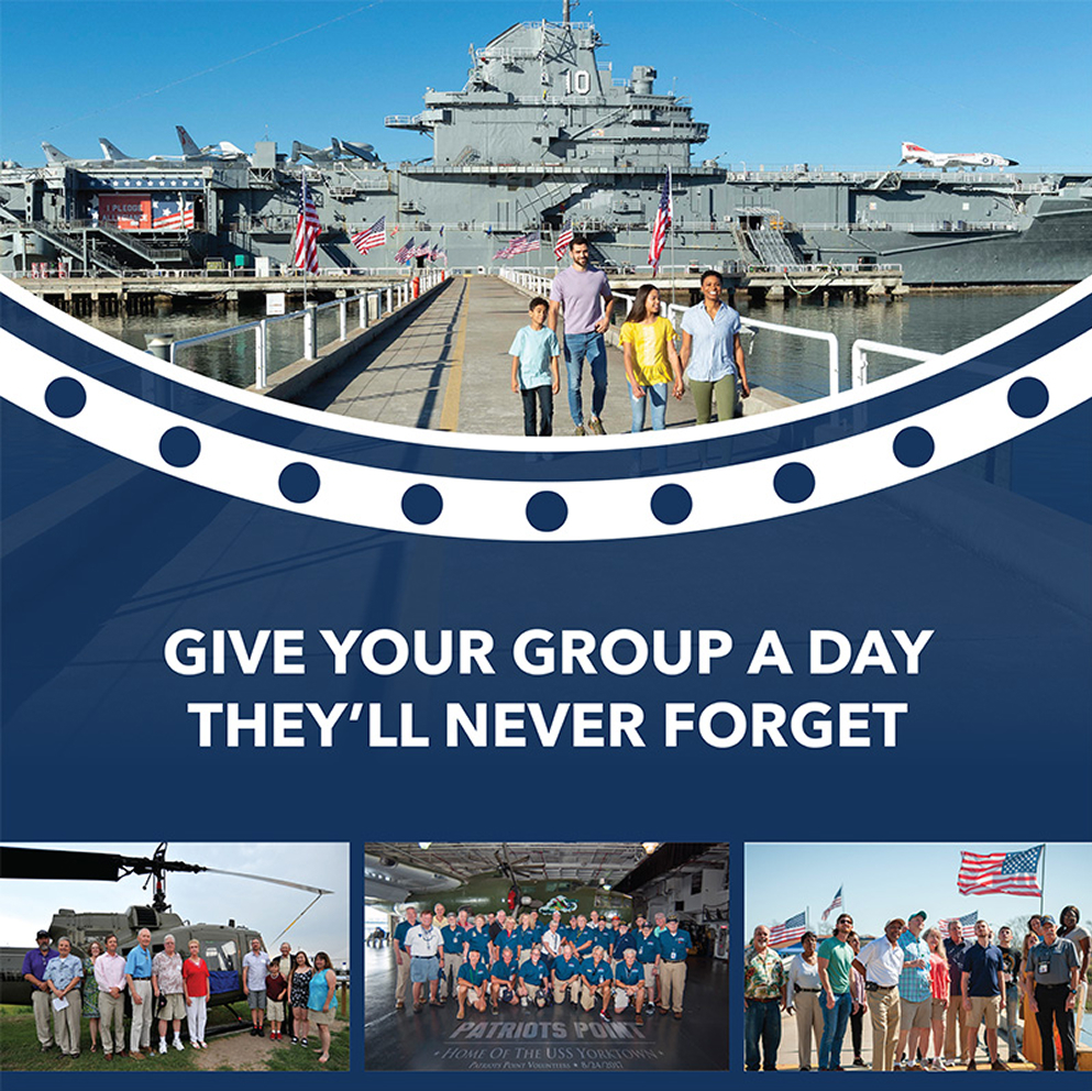 Family walking on pier toward USS Yorktown aircraft carrier