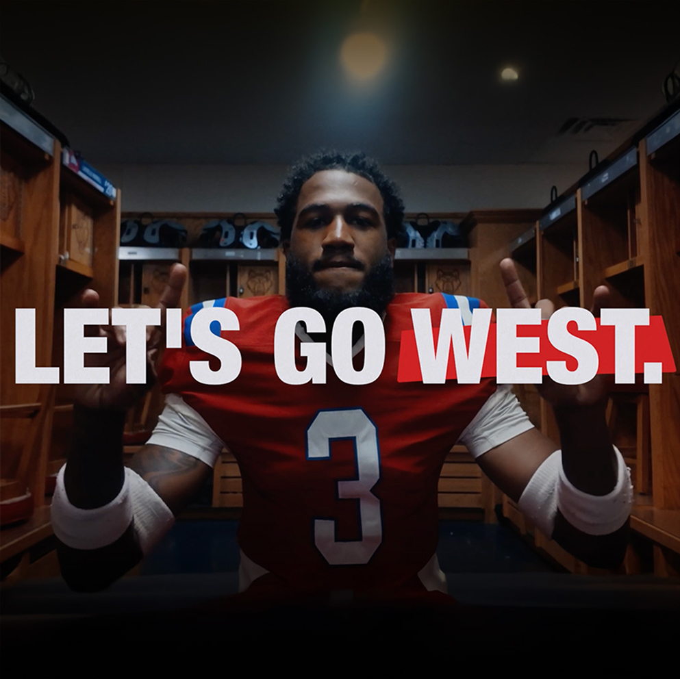 Football player in locker room with 'Let's Go West' text