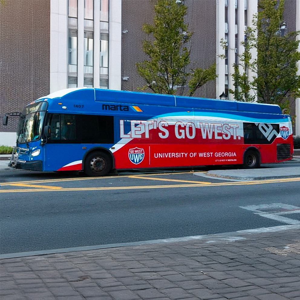 City bus wrapped with University of West Georgia 'Let's Go West' ad