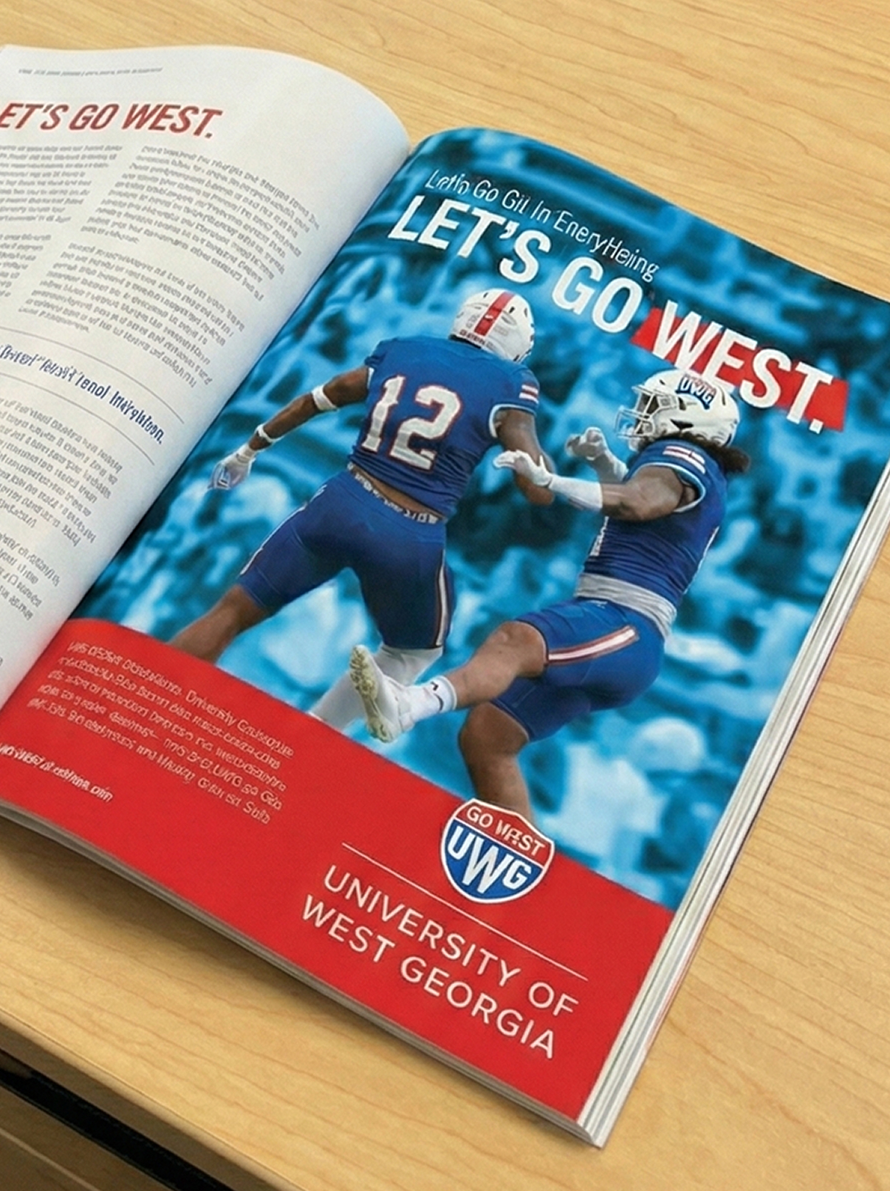 Open magazine spread featuring University of West Georgia football ad